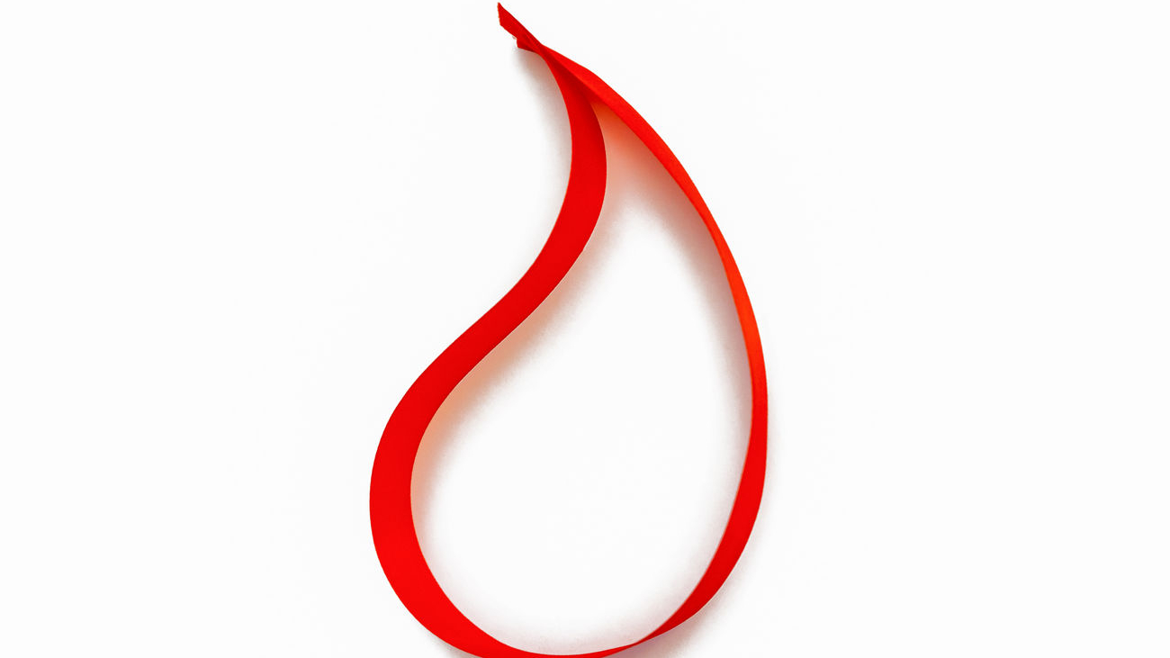 drop-red-satin-ribbon-white-background-blood-donation-symbol-concept
